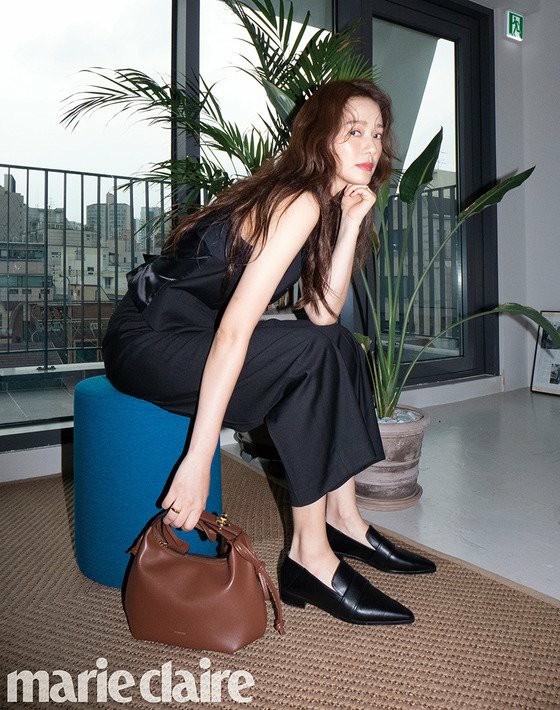 "Mrs. Kwon Sang Woo" actress Son Tae Yeon with a chic and sophisticated style.