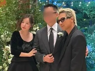 "BIGBANG" SOL and "secret" actress Min Hyolyn catch a surprise update at a friend's wedding