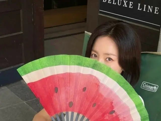 Actress Han Ji Min exudes playfulness and lovely charm with a watermelon fan