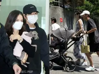 Song Joong Ki is a doting father...walking with his wife KEI Tee while pushing a stroller