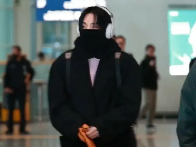 V (BTS) departs for overseas at Incheon International Airport.
