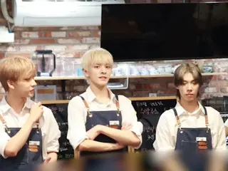 n.SSign becomes a barista for a day, ”I look so good in that apron”