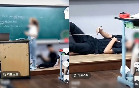 Middle school student lie down on podium and take pictures of female teacher even in class.