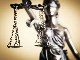 South Korean man drunk-driving 30cm, claims "the tire just rotated" - what punishment will he face?