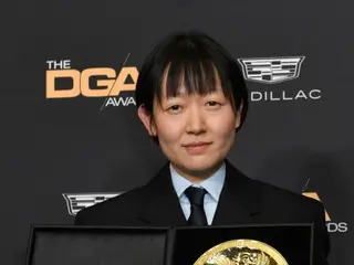 Director Celine Sohn receives the Directors Guild of America Award for Best New Director for the film ``Path Tribes''