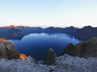 Baekdusan, a sacred mountain for Koreans, is registered with UNESCO under its Chinese name = South Korean report