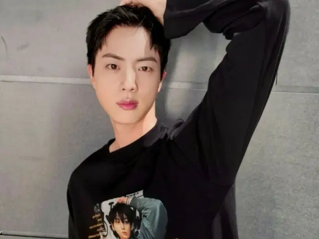BTS' JIN has become even more handsome, and his funny message and pose to his currently serving member JUNG KOOK are hot topics