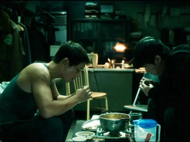 Song Joong Ki stars in "In This Badass World" and the film's footage of the pair eating homemade jjigae together, one after the other