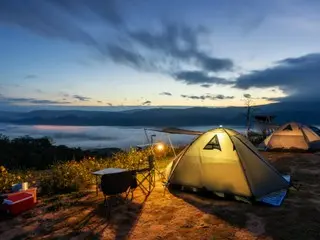 A man in his 30s was found dead at a campsite in Gapyeong County... "Traces of charcoal burning inside the tent"