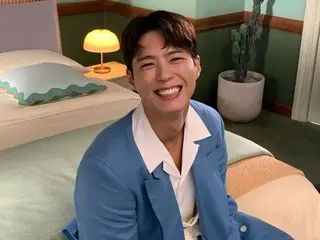 Actor Park BoGum shows off his big smile on the set of his commercial...you can almost hear the laughter