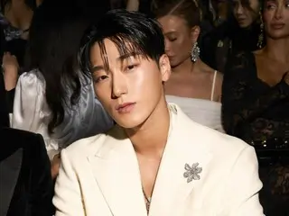 ATEEZ's Sun takes a photo with Madonna at Milan Fashion Week