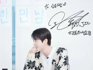 BTS' JIN, adorable with a shy smile... even a loving autograph