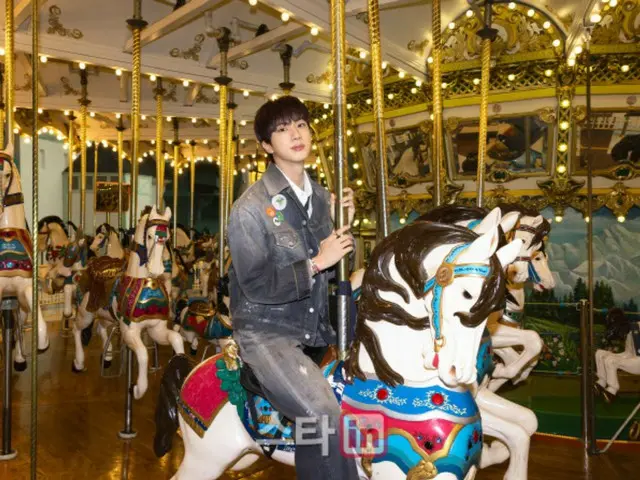 BTS' JIN goes 100 laps around the merry-go-round for fans