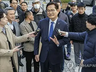 Former leader of main opposition party sentenced to two years in prison, not guilty of handing out cash during party leadership election - South Korean district court