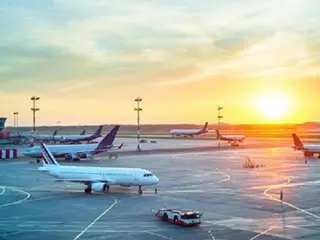 Man in his 30s caused Korean Air flight to be delayed for an hour at Jeju Airport after touching emergency exit out of "curiosity"