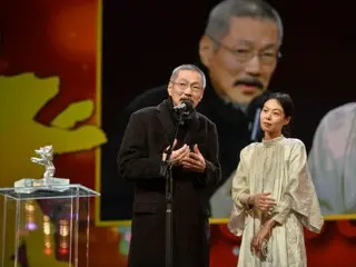 Kim Min Hee and director Hong Sang Soo visit Berlin... their bulging belly revealed