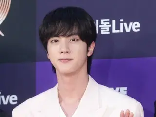 A Japanese woman in her 50s who ambush-kissed BTS member JIN turned herself in after entering Korea...sent to prosecutors