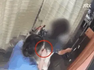 A Korean licensed practical nurse repeatedly removes a gold necklace from a child with a high fever in just 10 seconds