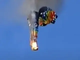 Hot air balloon catches fire and crashes in southern Brazil, killing eight; only jumper survives