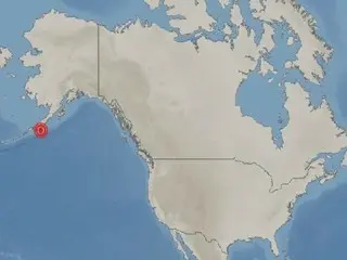 A strong earthquake measuring 7.3 on the Richter scale hits the coast of Alaska, temporarily issuing a tsunami warning