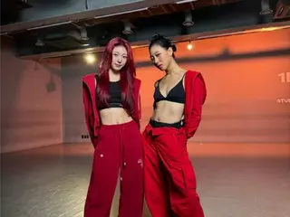 Arin from the new group "AtHeart" performs a pair dance with Leah Kim