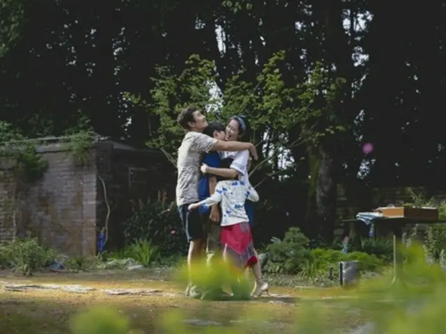 Lee Byung Hun and Song Yejin, who star as a married couple in the film "It Can't Be Helped," release a sweet family photo.