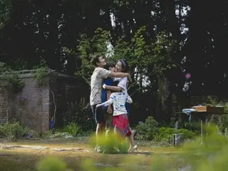 Lee Byung Hun and Song Yejin, who star as a married couple in the film "It Can't Be Helped," release a sweet family photo.