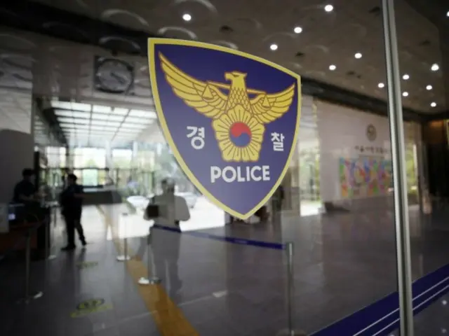 44 live bullets discovered in apartment building trash dump... CCTV footage shows serving police officer = South Korea