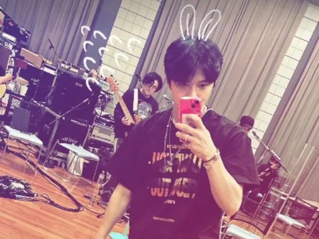 JAEJUNG has a fun look with a rabbit ear illustration... simple charm with bare feet and slippers