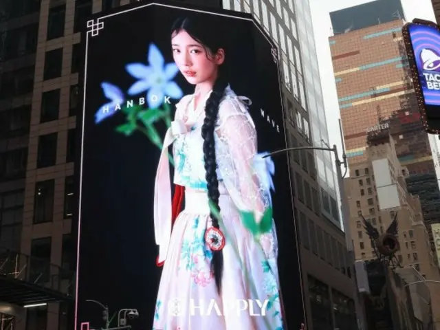 Suzy is photographed wearing hanbok in Times Square, New York... Promoting the value of hanbok