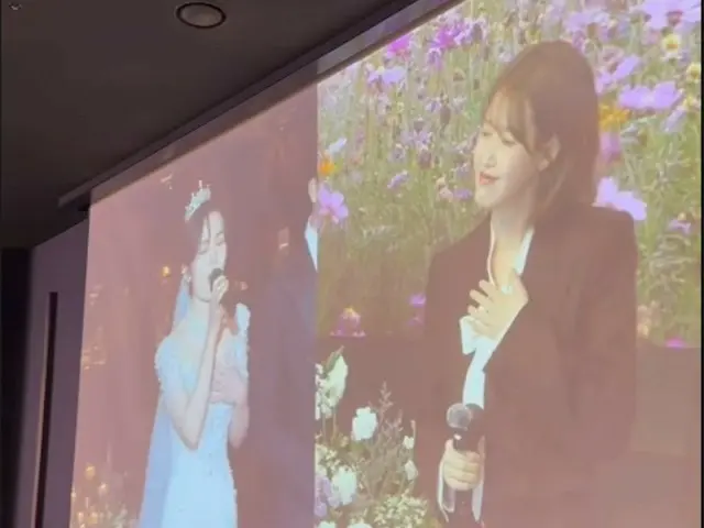 IU fulfills her obligation with a wedding song despite her busy schedule...duets ``The Meaning of You'' with the bride