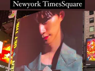 "2PM" JUNHO authenticates electronic billboard advertisement in New York's Times Square prepared by fans