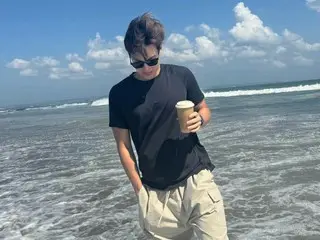 MONSTA X's Shownu reveals his vacation selfie... healing at the beach