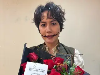 SUPER JUNIOR's Kyu Hyun greets fans after the premiere of musical "The Man Who Laughs"