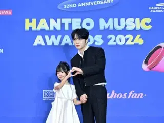 Jaejung and his cute partner attend the Hanteo Music Awards red carpet event