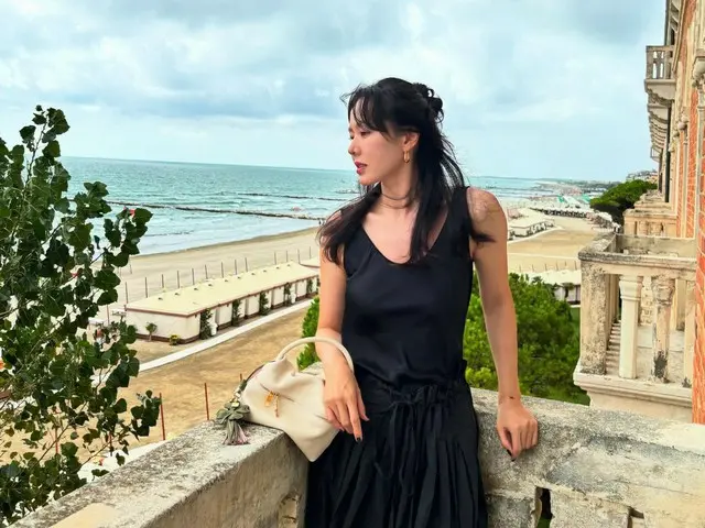 Actress Song Yejin appears in Venice in a black dress
