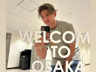 TVXQ's Changmin greets fans after the first day of his solo concert in Osaka