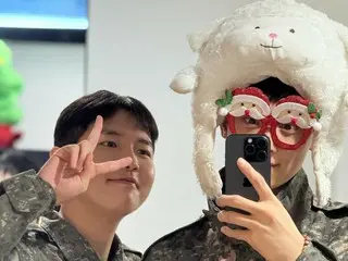 ASTRO's Cha Eun Woo and his colleague Kim Jae Hwan take a mirror selfie wearing military uniforms, Santa glasses, and sheep hats... They're so cute!